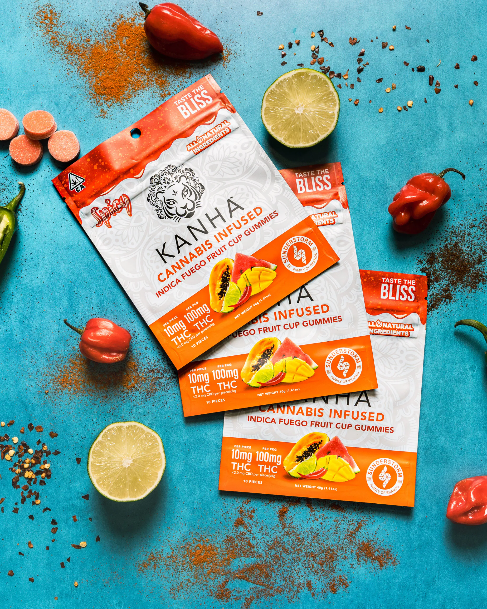 KANHA's spicy edible, Fuego Fruit Cup, surrounded by the flavors that inspired it.