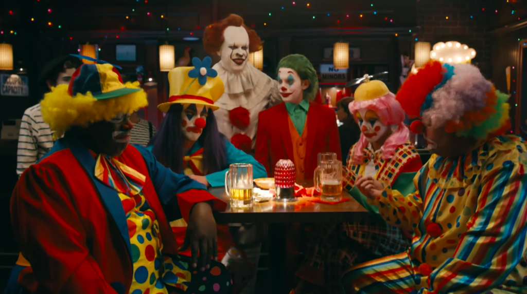 The Joker and Pennywise with some clowns